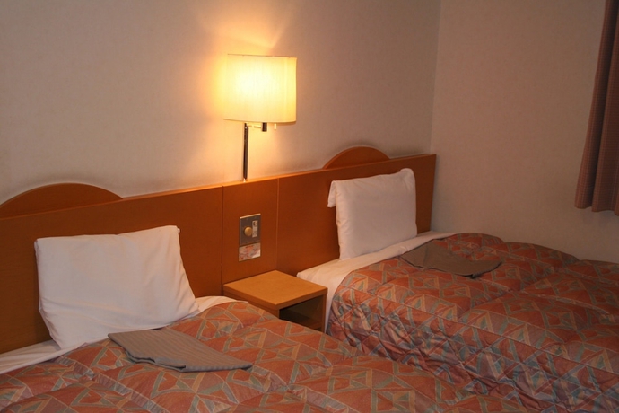 Imagen de la habitación del Hotel The Celecton Takamatsu. Foto 13