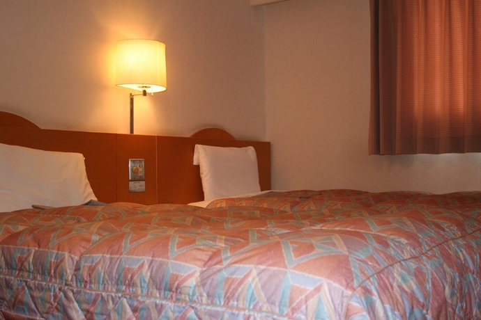 Imagen de la habitación del Hotel The Celecton Takamatsu. Foto 14