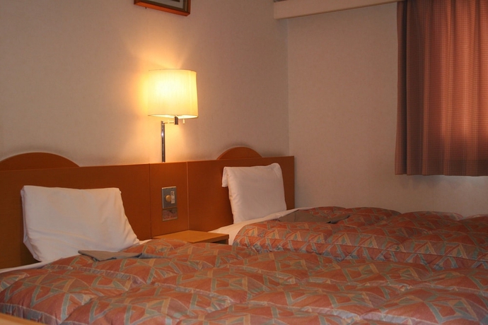 Imagen de la habitación del Hotel The Celecton Takamatsu. Foto 15