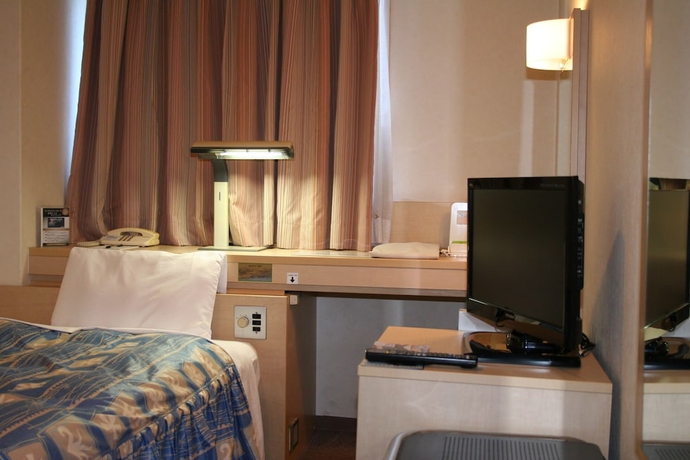 Imagen de la habitación del Hotel The Celecton Takamatsu. Foto 16