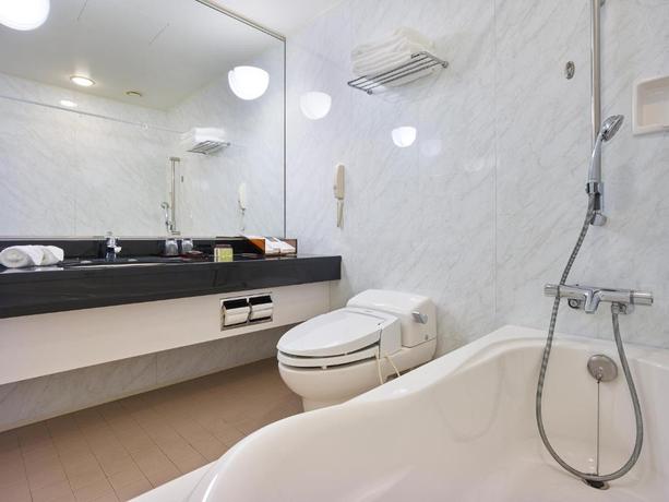 Imagen de la habitación del Hotel The Celestine Tokyo Shiba. Foto 11