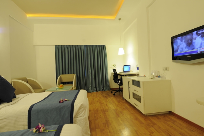 Imagen de la habitación del Hotel The Central Court. Foto 8