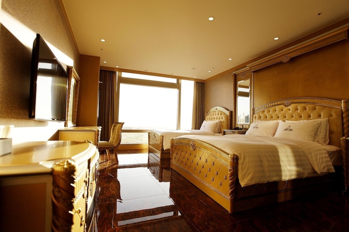 Imagen de la habitación del Hotel The Central Park Songdo. Foto 7