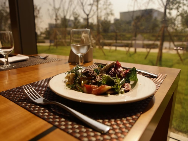 Imagen de la habitación del Hotel The Central Park Songdo. Foto 11