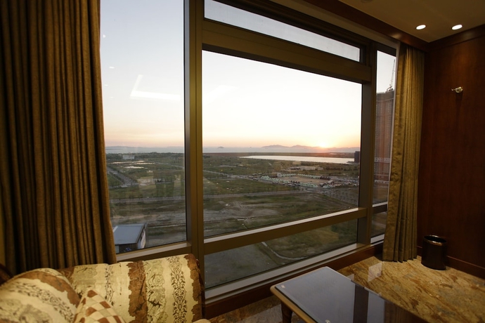 Imagen de la habitación del Hotel The Central Park Songdo. Foto 12