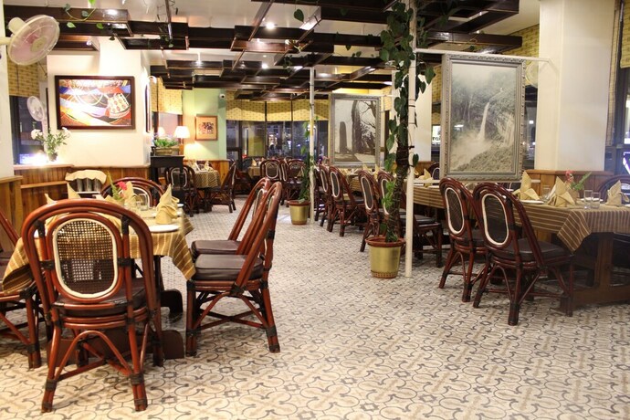 Imagen del bar/restaurante del Hotel The Centre Point. Foto 9