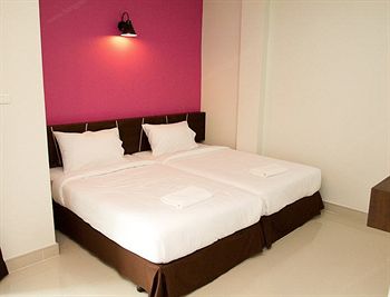 Imagen de la habitación del Hotel The Centrino Serviced Residence. Foto 7