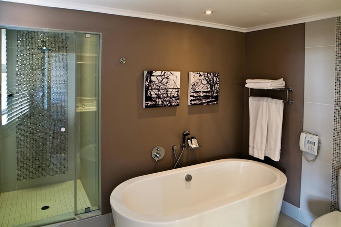 Imagen de la habitación del Hotel The Centurion. Foto 13