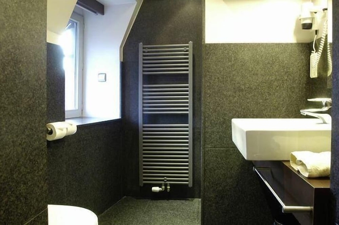 Imagen de la habitación del Hotel The Century, Hasselt. Foto 15