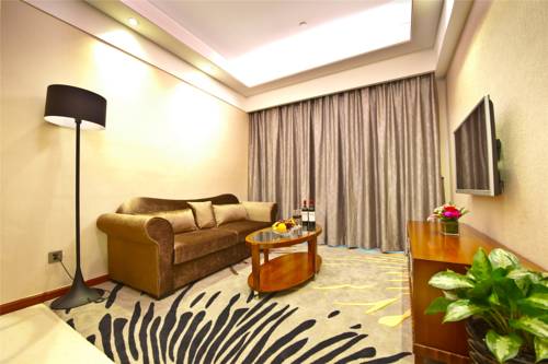 Imagen de la habitación del Hotel The Century, Zhongshan. Foto 3