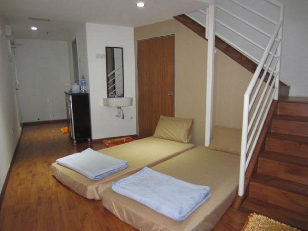 Imagen de la habitación del Hotel The Ceo Duplex Soho Suite. Foto 3