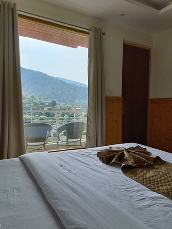 Imagen de la habitación del Hotel The Chail Pine Orchard Resort. Foto 4