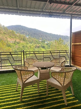 Imagen de la habitación del Hotel The Chail Pine Orchard Resort. Foto 9