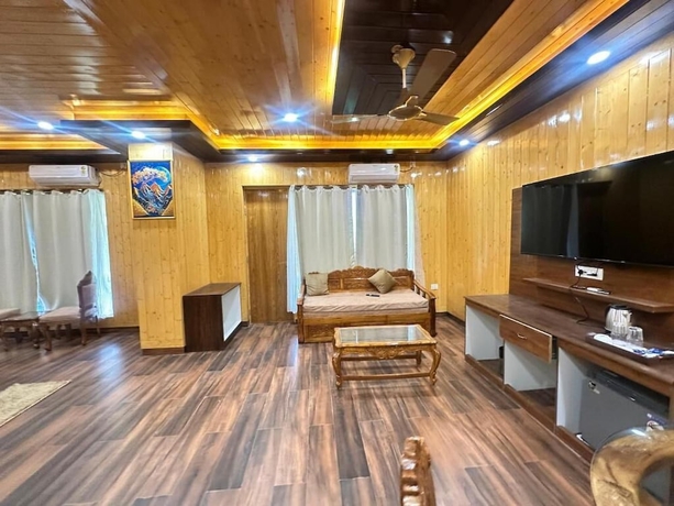 Imagen de la habitación del Hotel The Chail Pine Orchard Resort. Foto 11