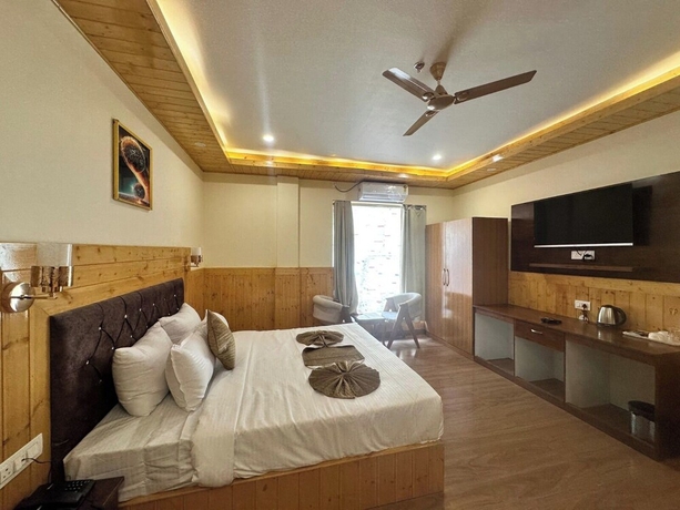 Imagen de la habitación del Hotel The Chail Pine Orchard Resort. Foto 13