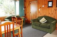 Imagen de la habitación del Hotel The Chalets Motel. Foto 4