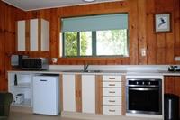 Imagen de la habitación del Hotel The Chalets Motel. Foto 5