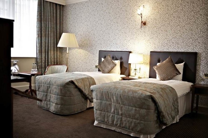 Imagen de la habitación del Hotel The Chamberlain. Foto 5