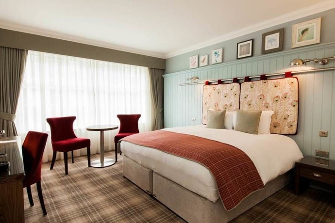 Imagen de la habitación del Hotel The Chamberlain. Foto 6
