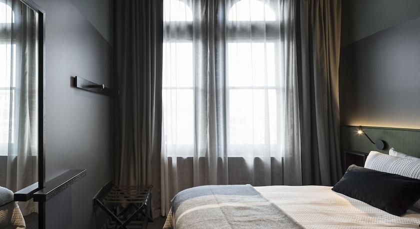 Imagen de la habitación del Hotel The Chamberson. Foto 12