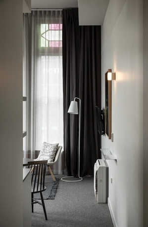 Imagen de la habitación del Hotel The Chamberson. Foto 16