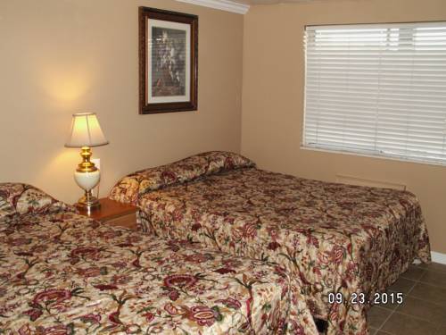Imagen de la habitación del Hotel The Charin Inn. Foto 4