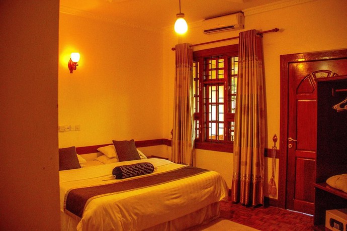 Imagen de la habitación del Hotel The Charity International. Foto 2
