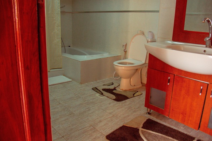 Imagen de la habitación del Hotel The Charity International. Foto 4