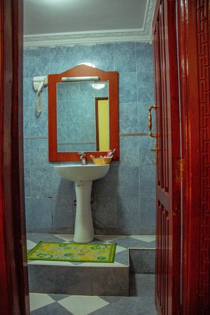 Imagen de la habitación del Hotel The Charity International. Foto 5