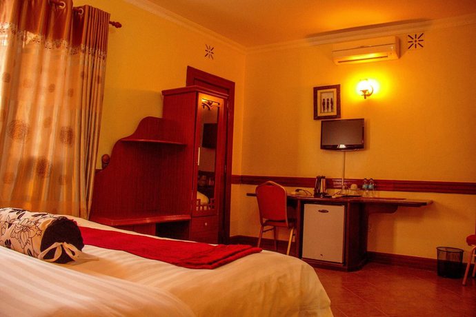 Imagen de la habitación del Hotel The Charity International. Foto 7