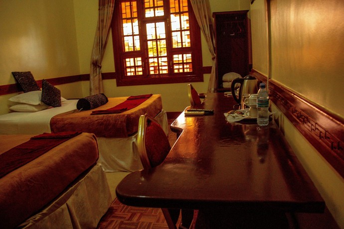 Imagen de la habitación del Hotel The Charity International. Foto 9
