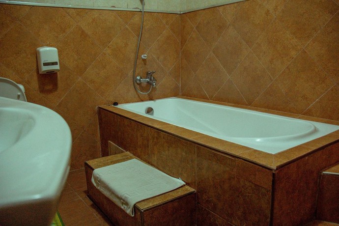 Imagen de la habitación del Hotel The Charity International. Foto 10