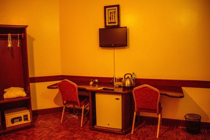 Imagen de la habitación del Hotel The Charity International. Foto 11