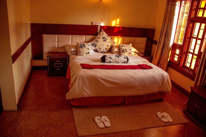 Imagen de la habitación del Hotel The Charity International. Foto 14