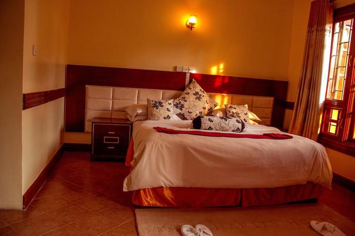 Imagen de la habitación del Hotel The Charity International. Foto 16