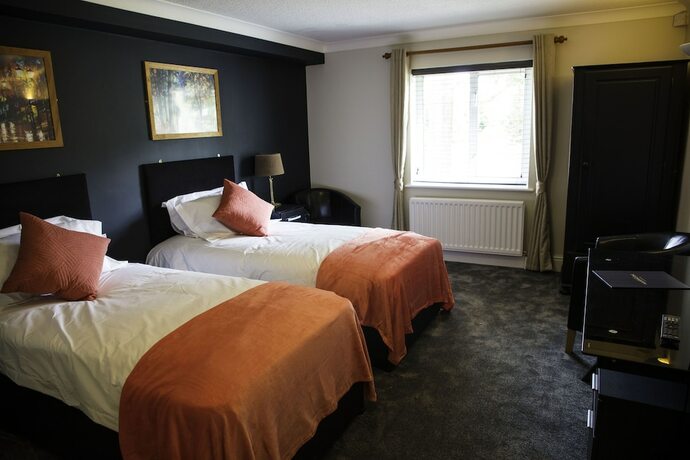 Imagen de la habitación del Hotel The Charlton Boutique. Foto 17