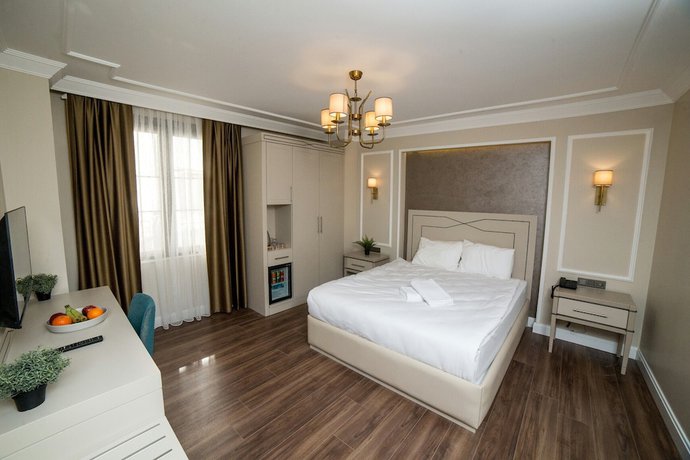 Imagen de la habitación del Hotel The Charm - Old City. Foto 10