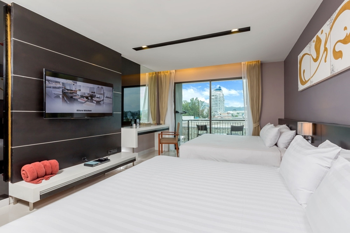 Imagen de la habitación del Hotel The Charm Resort Phuket. Foto 7