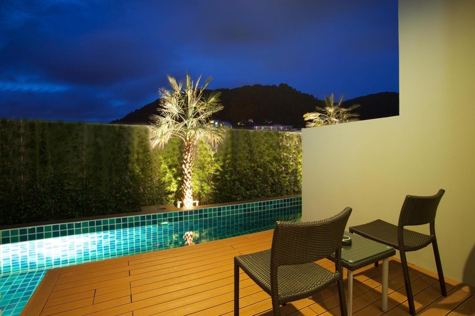 Imagen de los exteriores del Hotel The Charm Resort Phuket. Foto 13