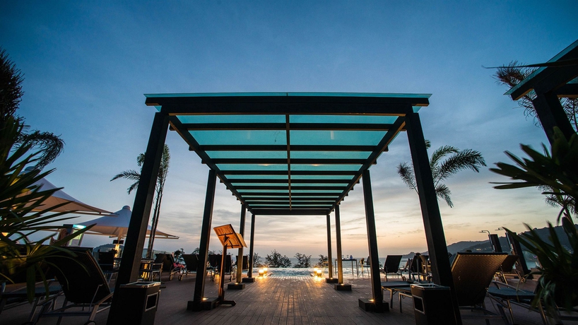 Imagen del bar/restaurante del Hotel The Charm Resort Phuket. Foto 3