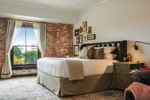 Imagen de la habitación del Hotel The Charmant. Foto 4