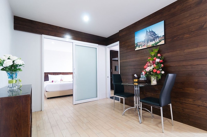 Imagen de la habitación del Hotel The Chateau Chiang Mai Residence. Foto 9