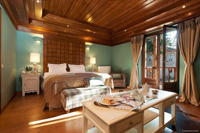 Imagen de la habitación del Hotel The Chatzigaki Manor. Foto 15