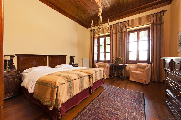 Imagen de la habitación del Hotel The Chatzigaki Manor. Foto 17