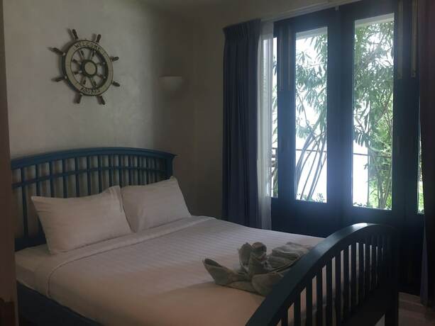 Imagen de la habitación del Hotel The Che Pool Access Beachfront Condo By Away. Foto 20