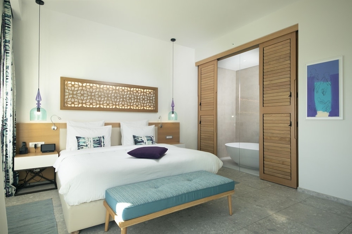 Imagen de la habitación del Hotel The Chedi Lustica Bay. Foto 13