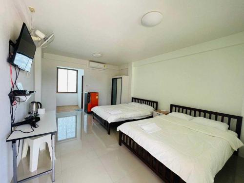 Imagen de la habitación del Hotel The Chev. Foto 11