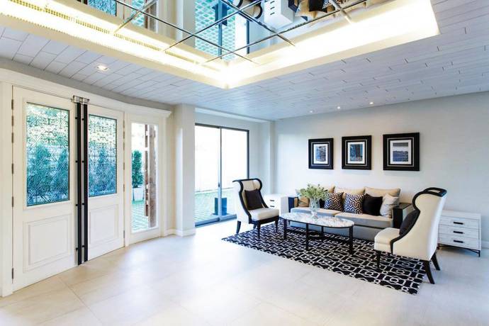 Imagen de la habitación del Hotel The Chiang Mai Riverside. Foto 5