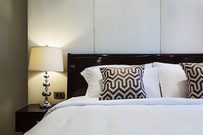 Imagen de la habitación del Hotel The Chiang Mai Riverside. Foto 8