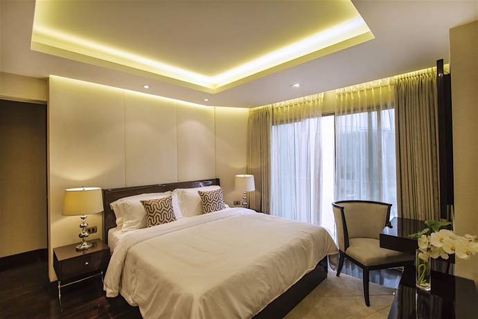 Imagen de la habitación del Hotel The Chiang Mai Riverside. Foto 15